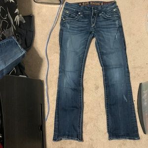 Dark jeans, front pockets, Bling, good fitting.